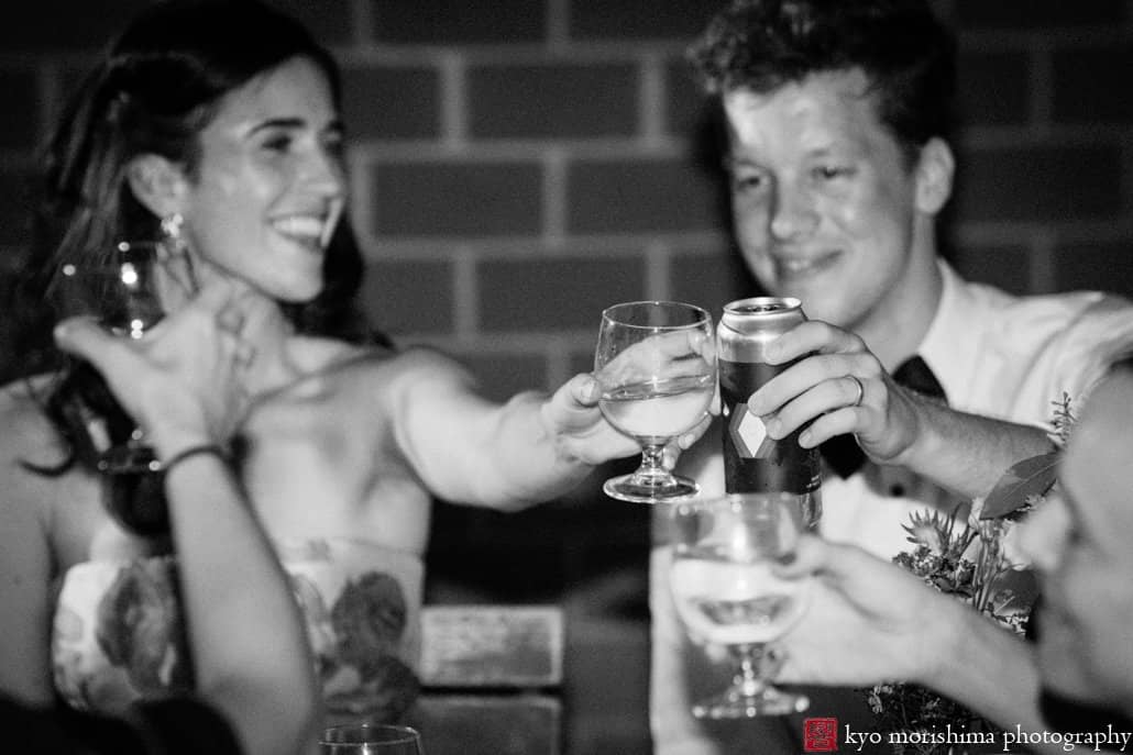 Bride and groom toast during Frankies 457 Spuntino wedding reception, photographed by Kyo Morishima