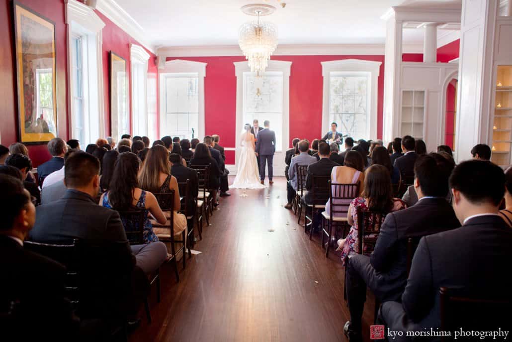 A wide view of the red room during India House wedding ceremony photographed by Kyo Morishima