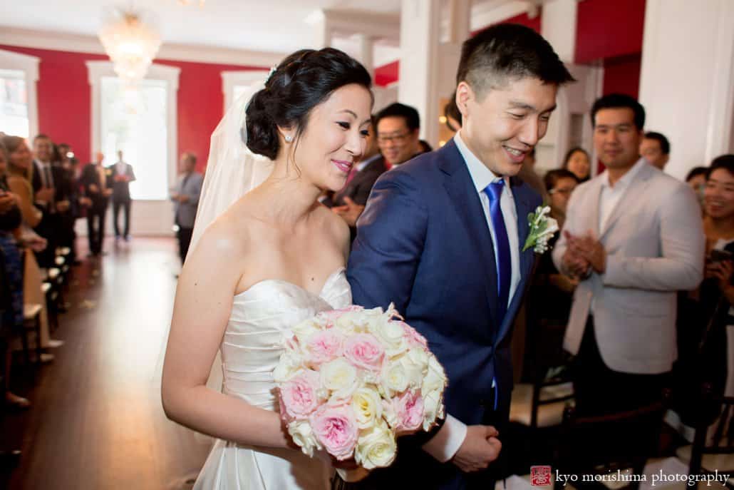 Bride and groom depart the ceremony at India House, photographed by NYC Korean wedding photographer Kyo Morishima