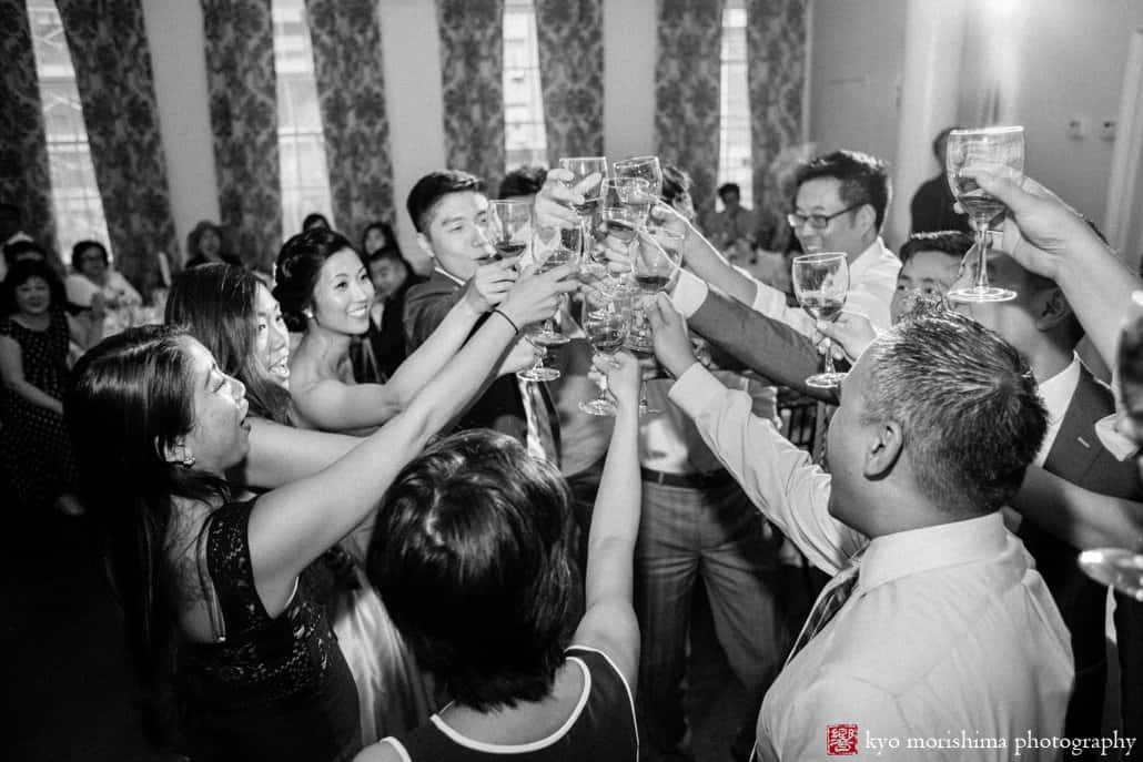 Toasting during Korean wedding in NYC, photographed by India House wedding photographer Kyo Morishima