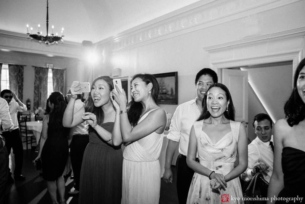 Guests cheer during India House wedding photographed by Kyo Morishima