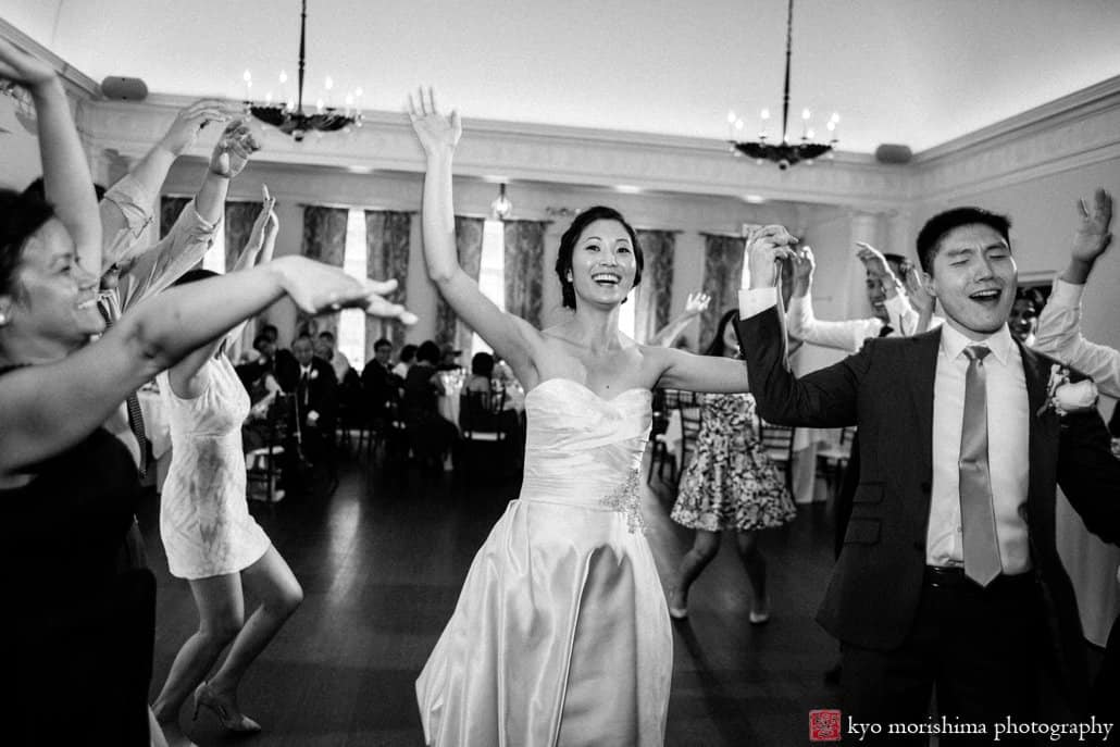 Korean bride dances during India House wedding in downtown NYC, photographed by Kyo Morishima