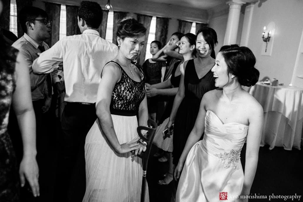 Bride and friend laugh during Korean wedding at India House, photographed by Kyo Morishima