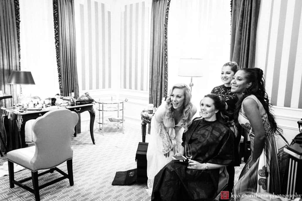 Bride and friends pose for photo at St. Regis Hotel, photographed by Manhattan wedding photographer Kyo Morishima