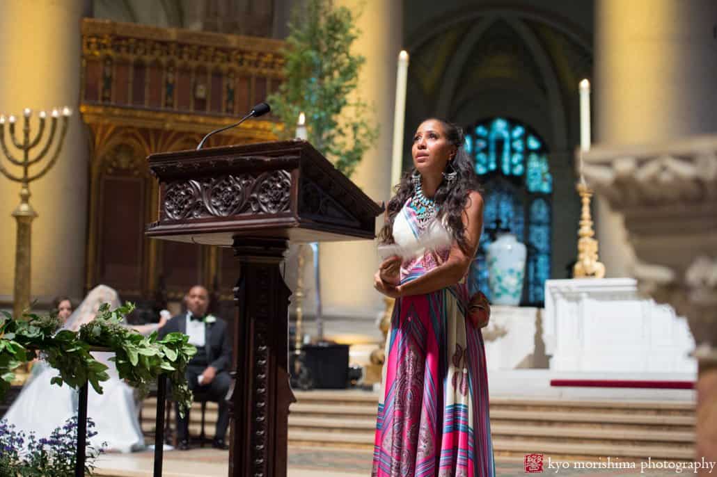 Sister of the groom gives a poignant reading during St. John the Divine wedding ceremony