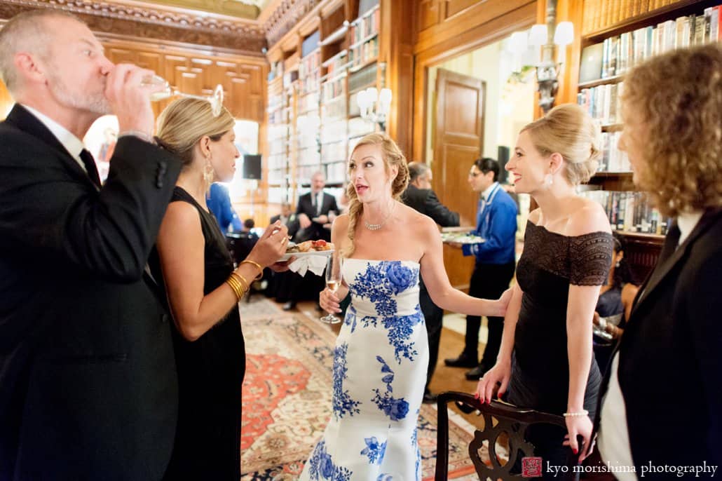 Bride wearing Monique Lhuillier chats with guests at Lotos Club wedding photographed by Kyo Morishima