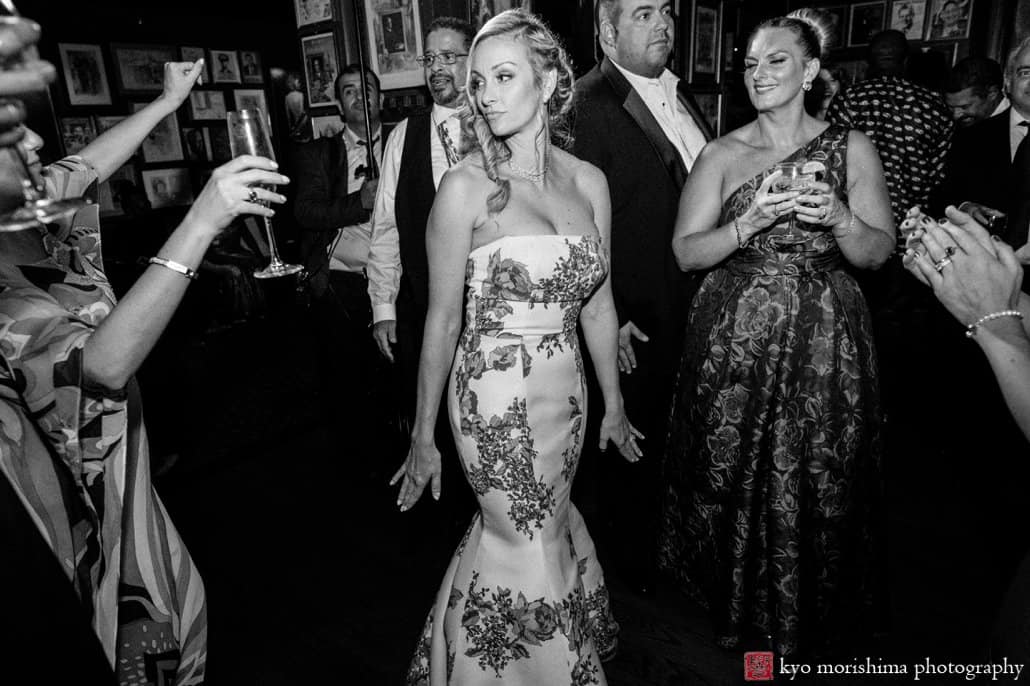 Bride wearing Monique Lhuillier rose print wedding dress poses during after party at The Lotos Club, photographed by Kyo Morishima