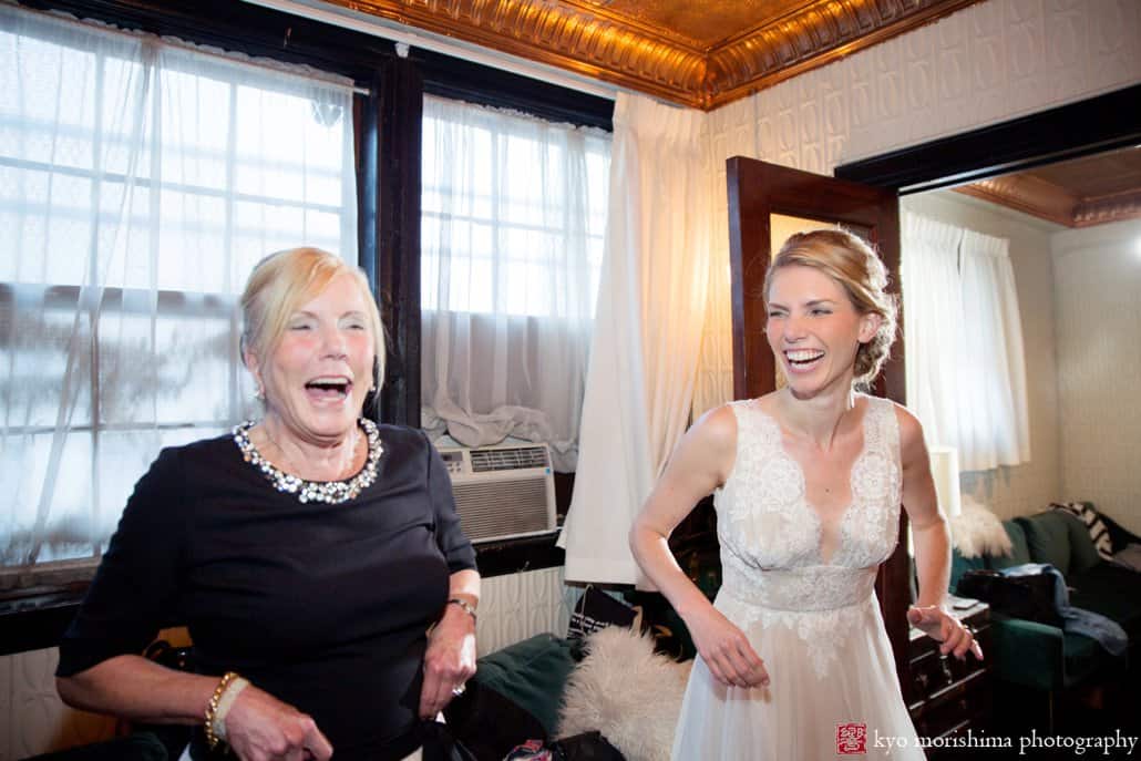 Bride and mother share a laugh while getting ready for Green Building wedding in Brooklyn, photographed by Kyo Morishima