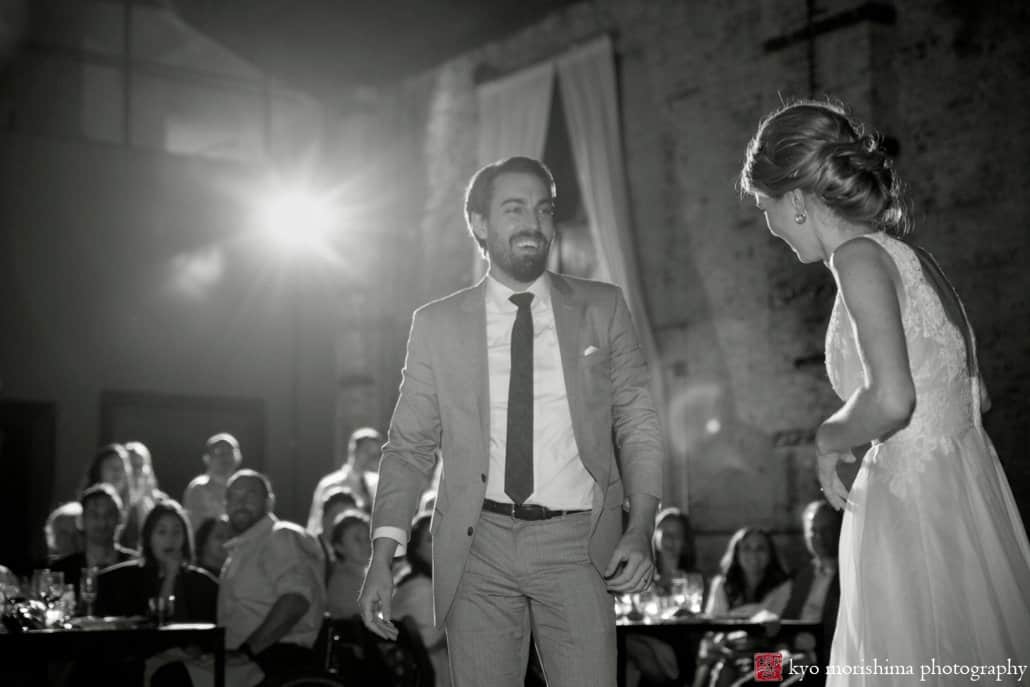 Bride and groom smile and laugh as first dance ends at Green Building wedding in Brooklyn, photographed by Kyo Morishima