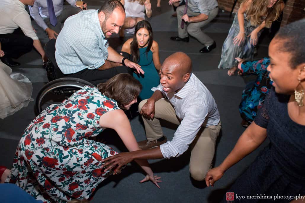 Guests get down on the dance floor with music by DJ OP! at Green Building wedding in Brooklyn, photographed by Kyo Morishima