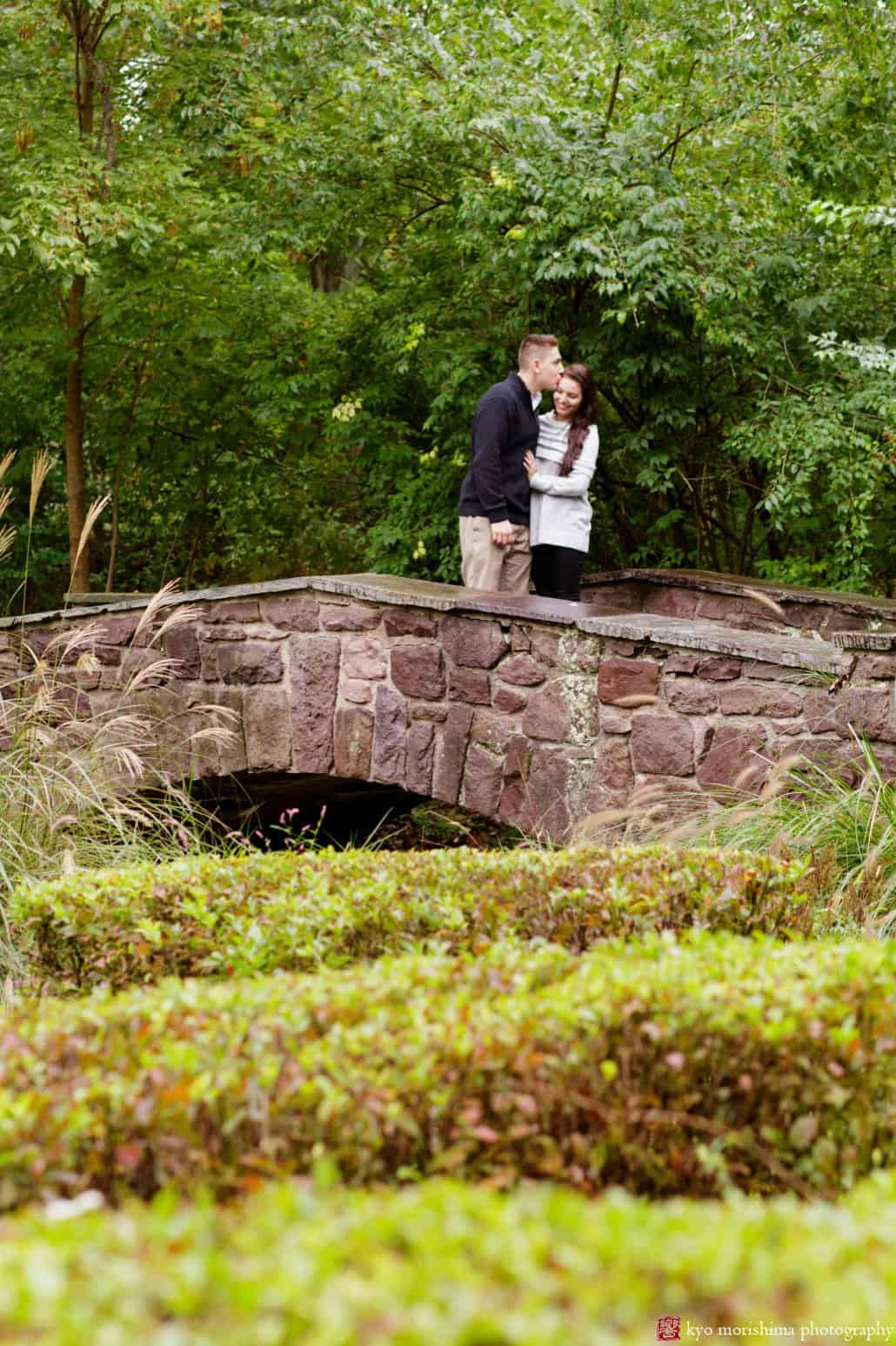 Engagement picture on a bridge at Jasna Polana, Princeton