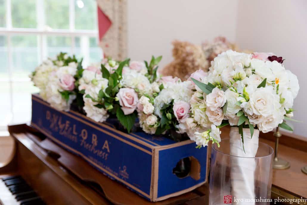 Wedding flowers from Viburnum on the dining room table at bride's grandparents' house, photographed by Kyo Morishima