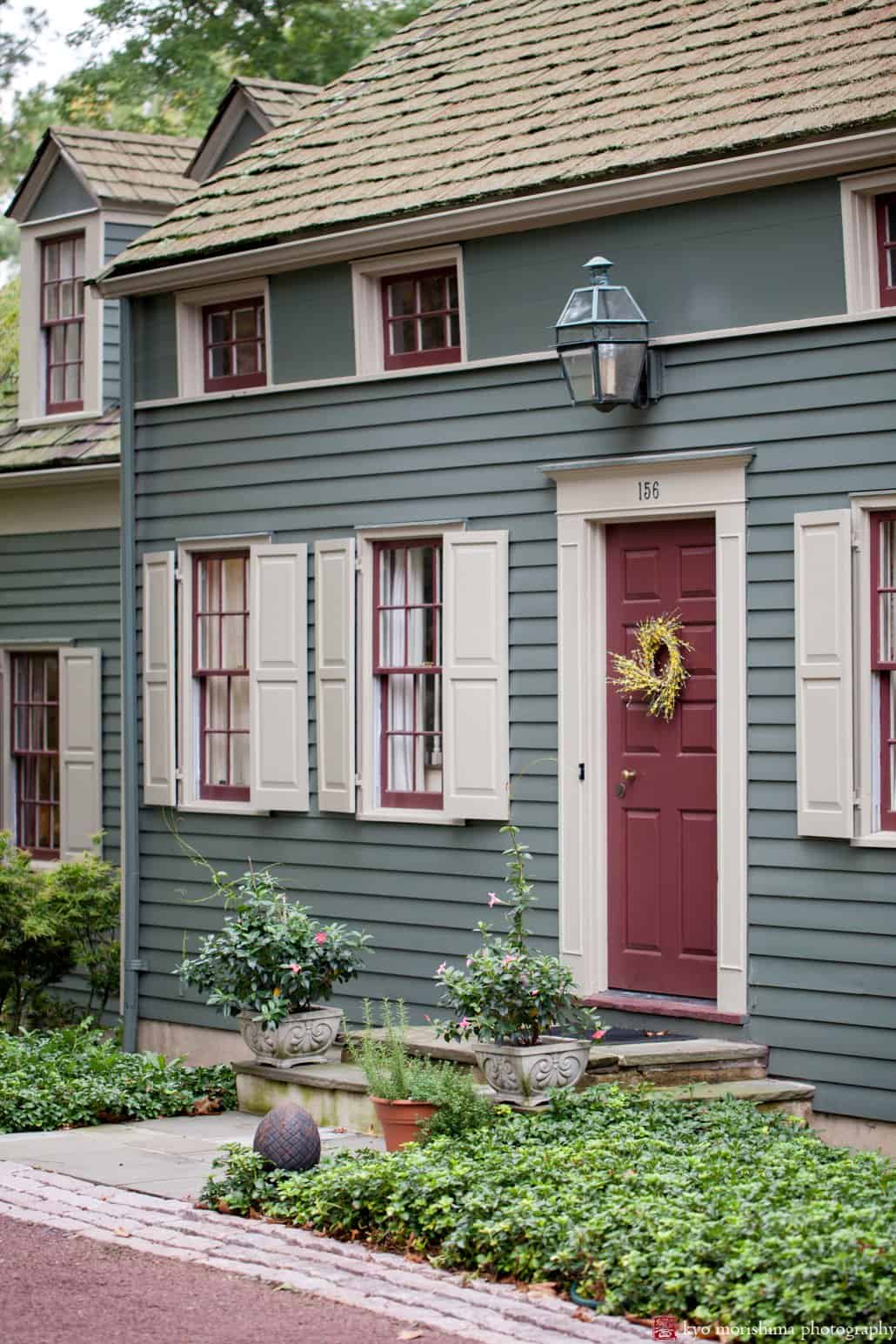 Princeton home painted blue with red door, photographed by Kyo Morishima