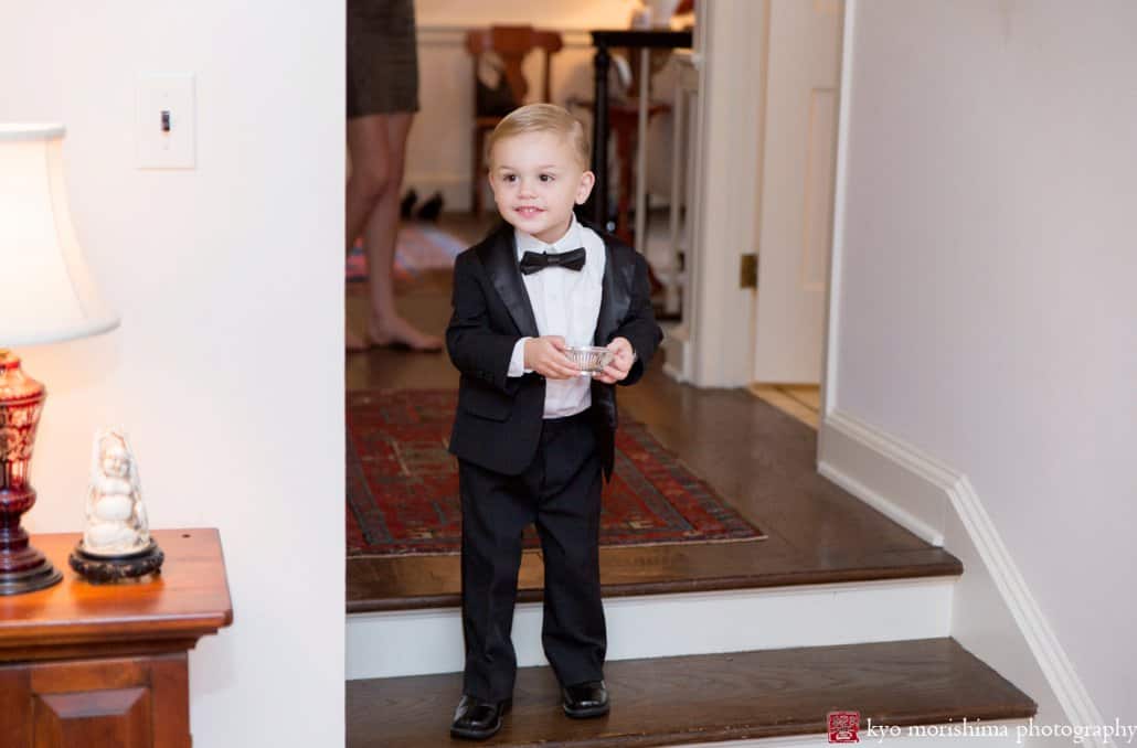 Ringbearer sees bride for the first time as he enters living room in Princeton home