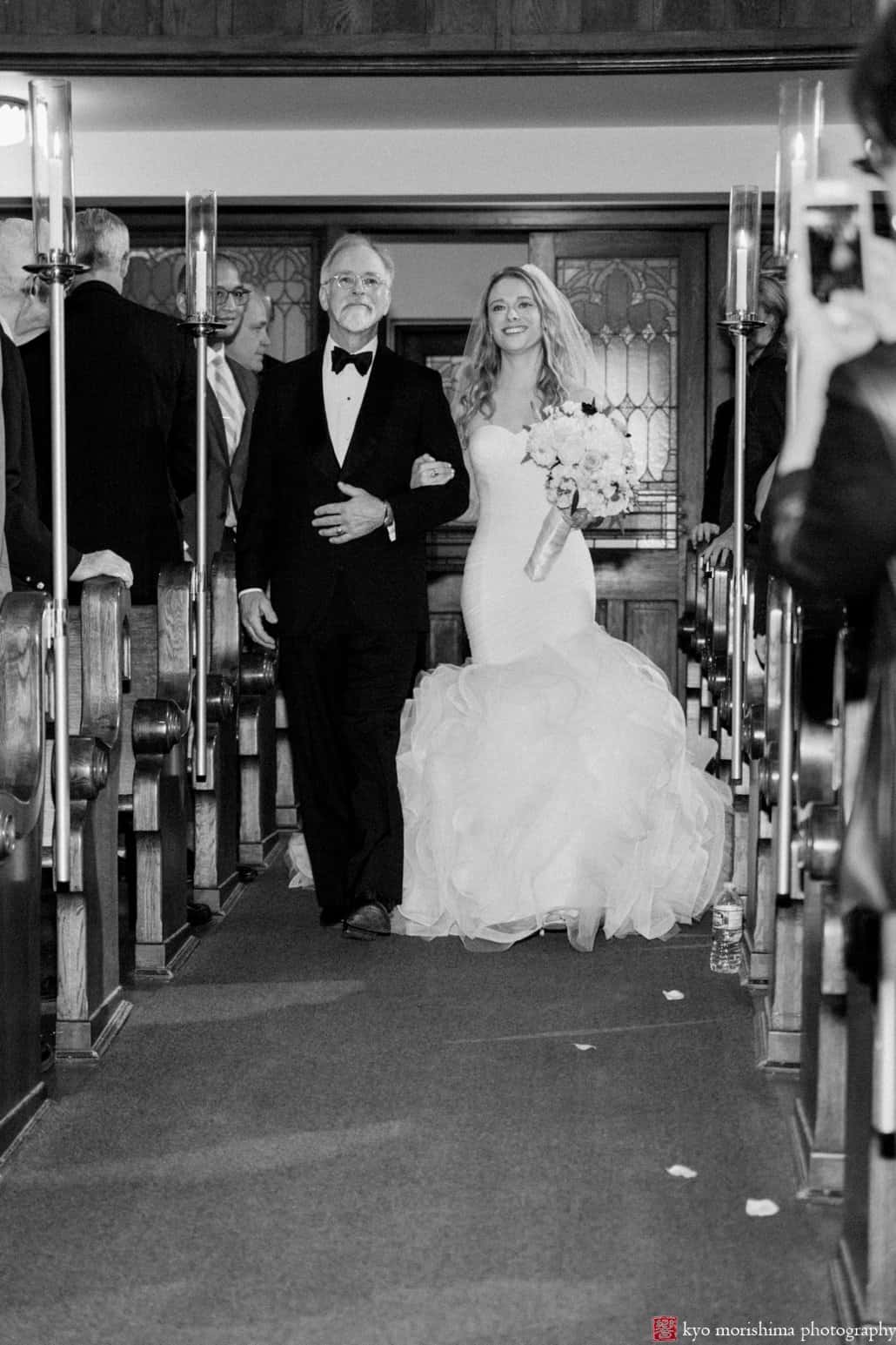 Bride walks down the aisle at Princeton United Methodist Church