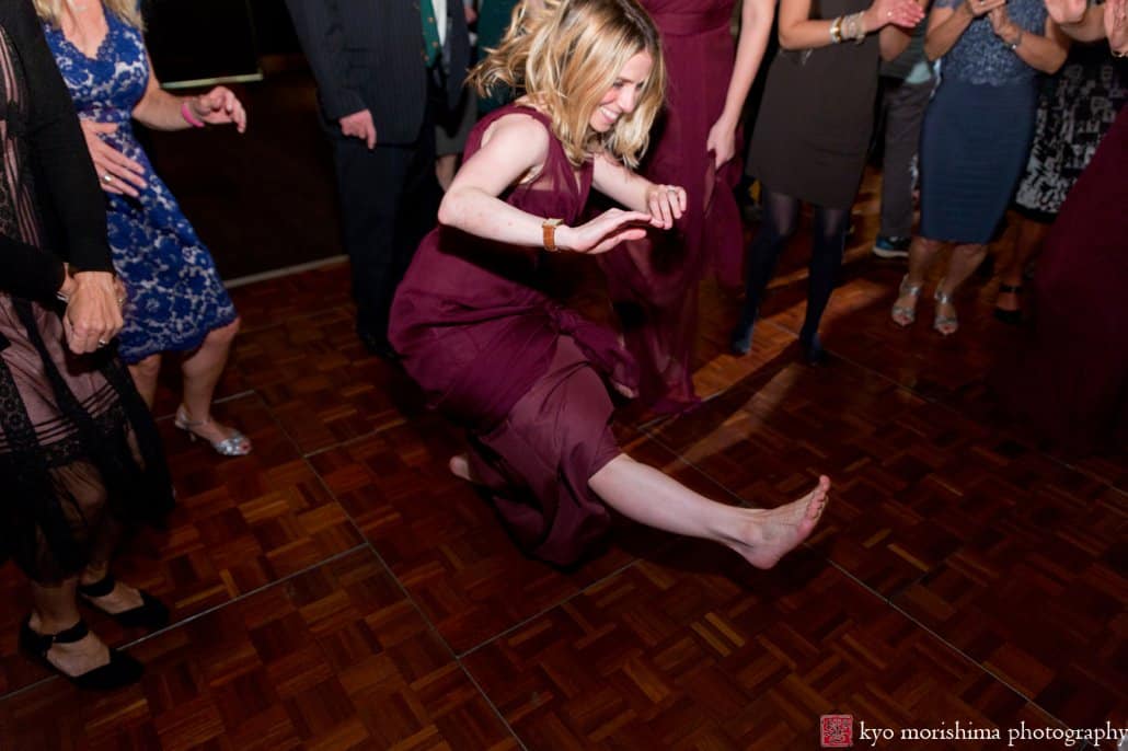 Maid of honor shows off her dance moves during Cherry Valley Country Club wedding reception with music by 74 Events