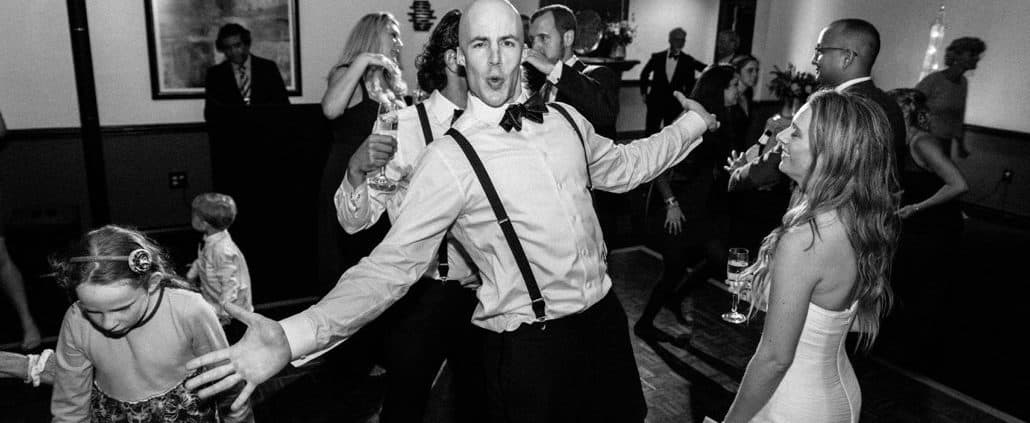 Bride and groom have a blast dancing together during Cherry Valley Country Club wedding in Princeton