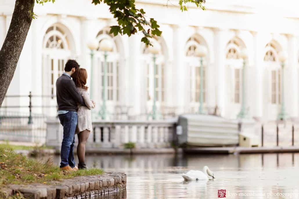 Gazing at the collonade in Prospect Park; engagement picture photographed by Kyo Morishima