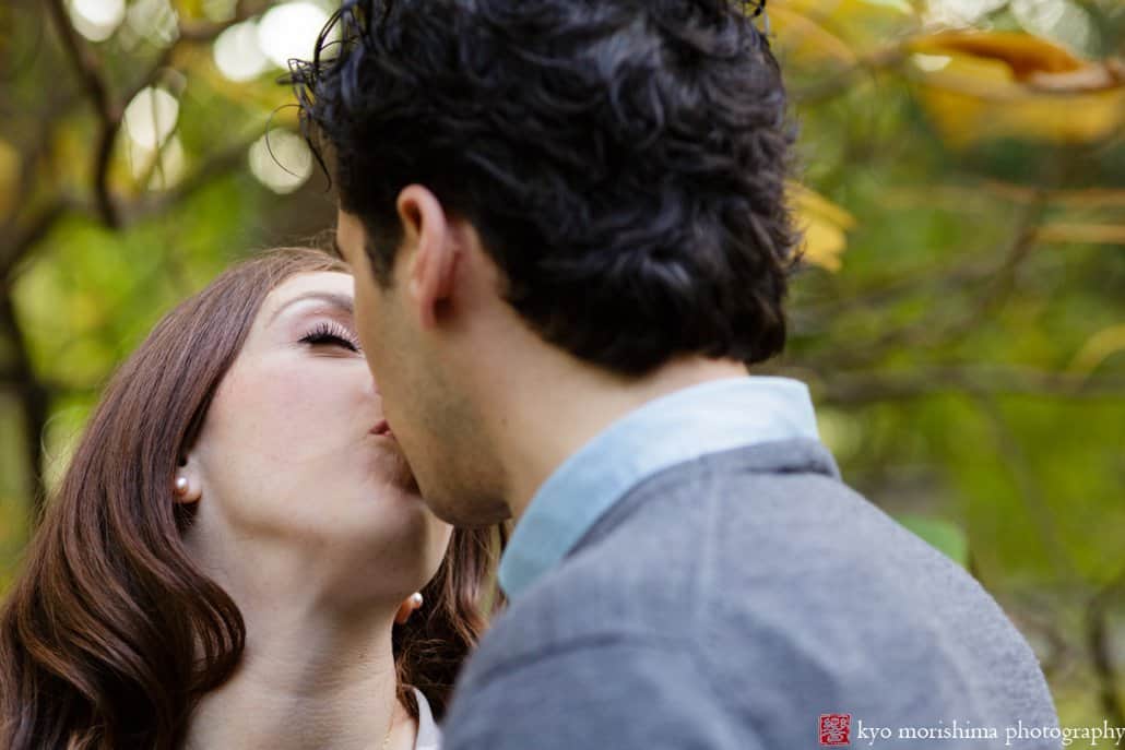 Engagement photo kiss at Prospect Park, photographed by Kyo Morishima