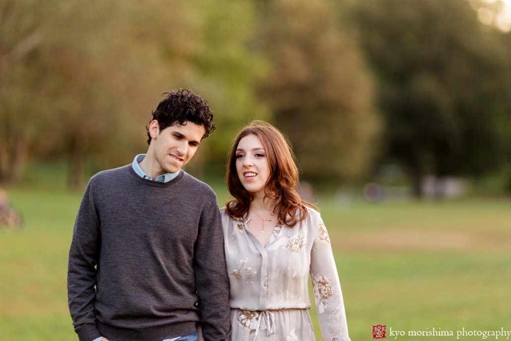 Couple walking across the lawn at Prospect Park in Brooklyn, photographed by Kyo Morishima