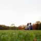Prospect park engagement picture: couple kissing on the great lawn photographed by Kyo Morishima