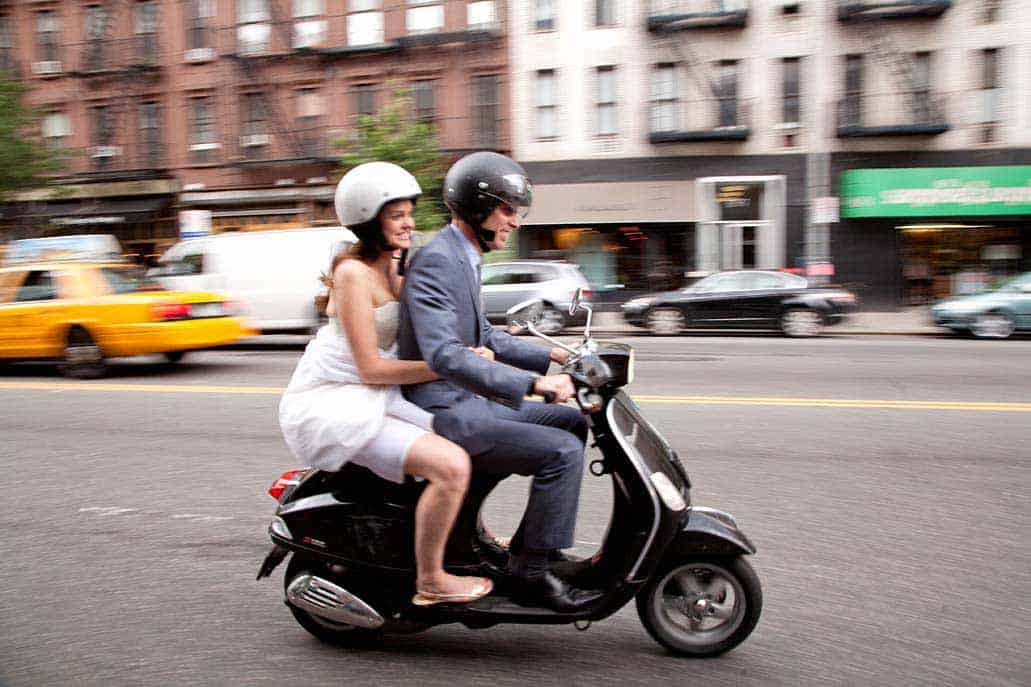 bride and groom on a vespa, nyc, street on their way to Governors Island Ferry Terminal by kyo morishima kmp6262011-072