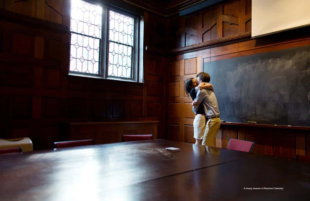 A couple kiss passionately inside a Princeton University classroom during engagement session photographed by Kyo Morishima