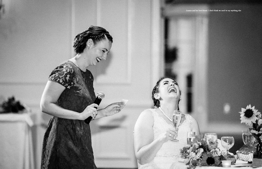 Bride laughs uproariously as bridesmaid offers a toast at Perona Farms wedding