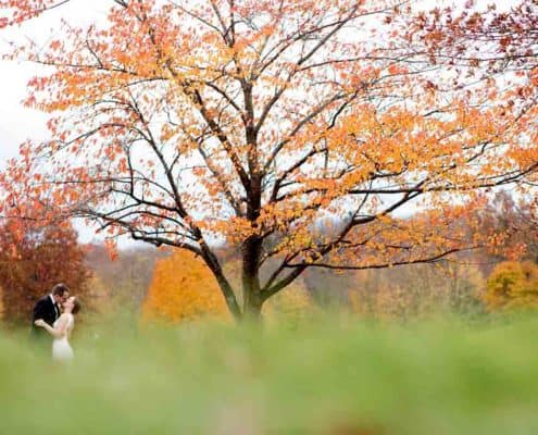 Fall wedding bride and groom portrait foliage at Jasna Polana, Princeton NJ