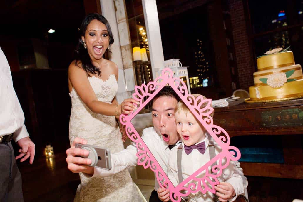 Metropolitan Building wedding reception: Picture time with bride, groom, and ring bearer 