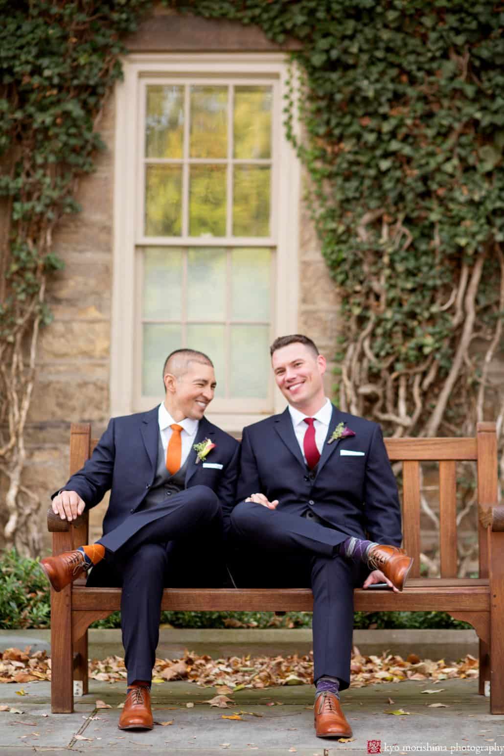 Princeton same sex marriage wedding portrait on a park bench framed with ivy