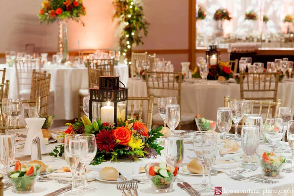 Monday Morning Flowers colorful fall centerpieces with lanterns at Hyatt Regency wedding