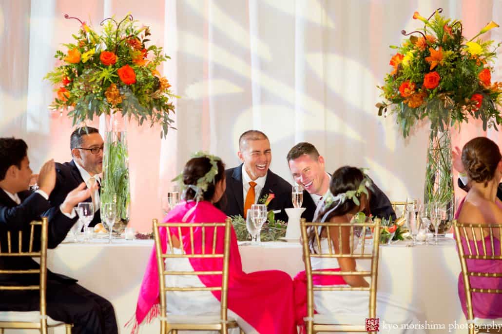 Grooms laugh during toasts at Hyatt Regency Princeton wedding reception