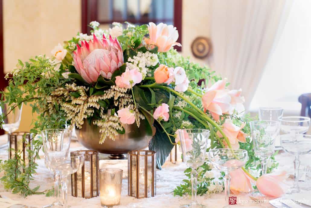 Protea flower wedding centerpiece with cascading pale pink tulips, by Viburnum Designs in Princeton