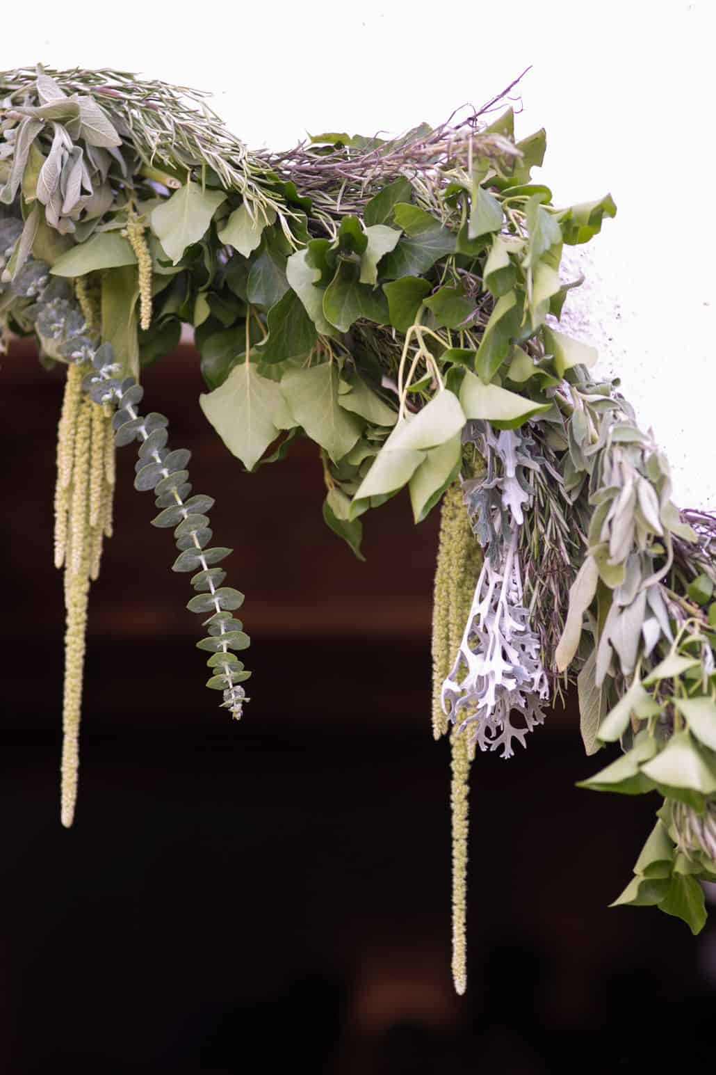 Sage, green and purple archway at European destination wedding in Swiss Alps. Gardenias Floral, Waldhaus Hotel