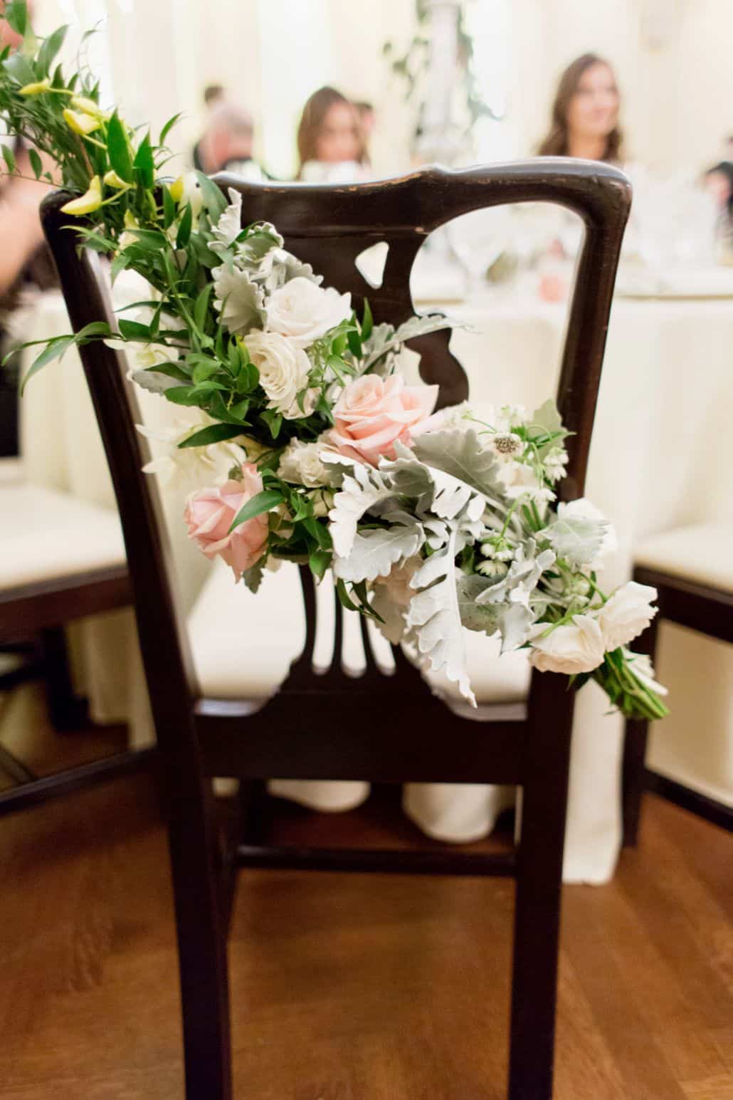 white, pink and sage floral chair swag, dark wood chair, Lotos Club NYC, Fleur du Mois Florist, New York wedding photographer.