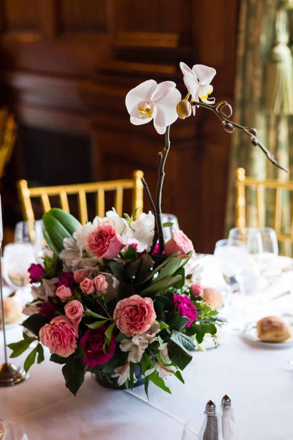 pink and fuscia rose wedding centerpiece with orchid, white linens, gold chiavari chairs, Karen Brown Events NYC wedding photographer.