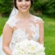 bride in floating lace gown holds cream colored bouquet with roses, peony and hydrangea. Janet Makrancy's Weddings and parties florist, Jasna Polana Princeton, NJ wedding photographer.