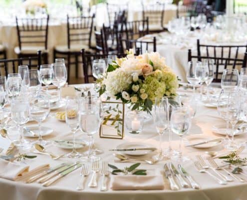 green and cream hydrangea, pink rose and peony wedding centerpiece. white table linens accented with eucalyptus, black chiavari chairs, clear stemware, Janet Makrancy's weddings and Parties florist, Jasna Polana Princeton NJ wedding Photographer.