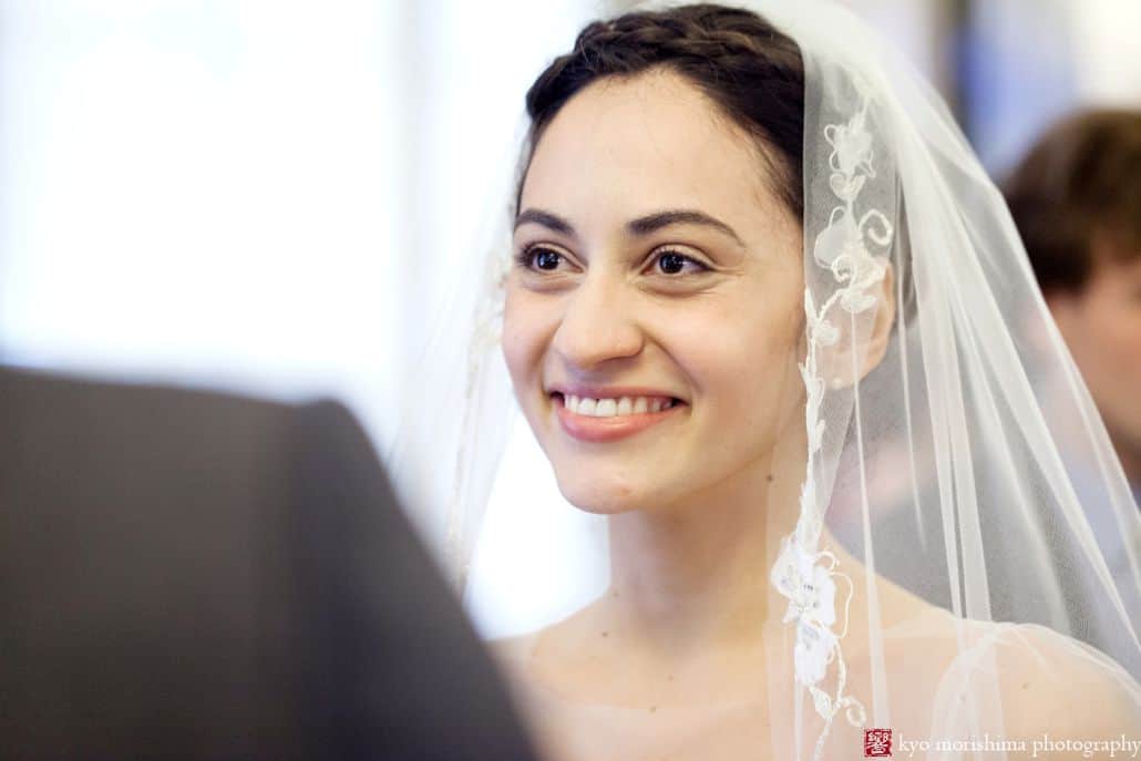 Portrait of bride with lace trimmed veil during NYC City Hall elopement wedding