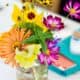 Bright pink, yellow and orange wildflowers with mint in mason jars wedding table centerpiece, Brooklyn Grange, Brooklyn Navy Yard, Jenn Florin florist, New york wedding photographer.