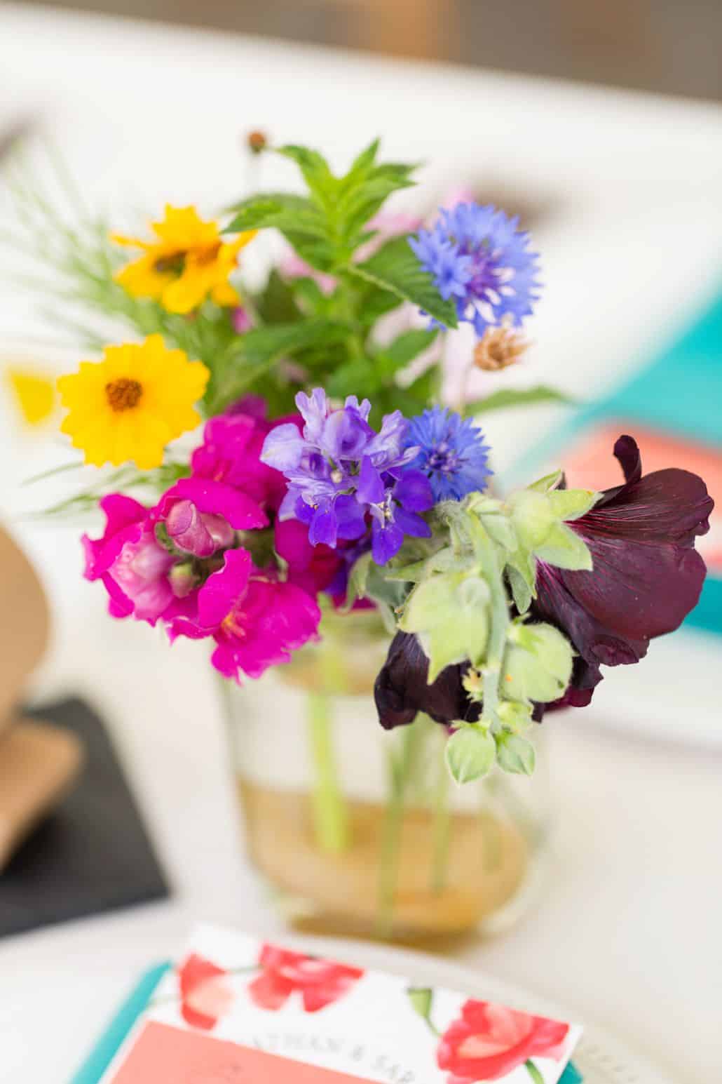 jewel tone wildflowers with mint in mason jar wedding table centerpiece Brooklyn Grange, Brooklyn Navy Yard, Jenn Florin florist, New York wedding photographer.