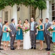 Morven House wedding party portrait with Chinese wisteria draped across porch in the background