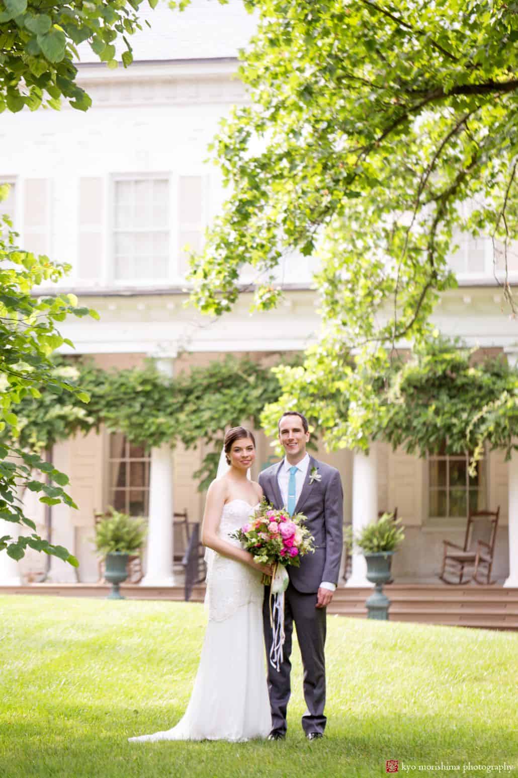 Morven museum House wedding photo: formal portrait of the bride and groom on the front lawn, taken in June