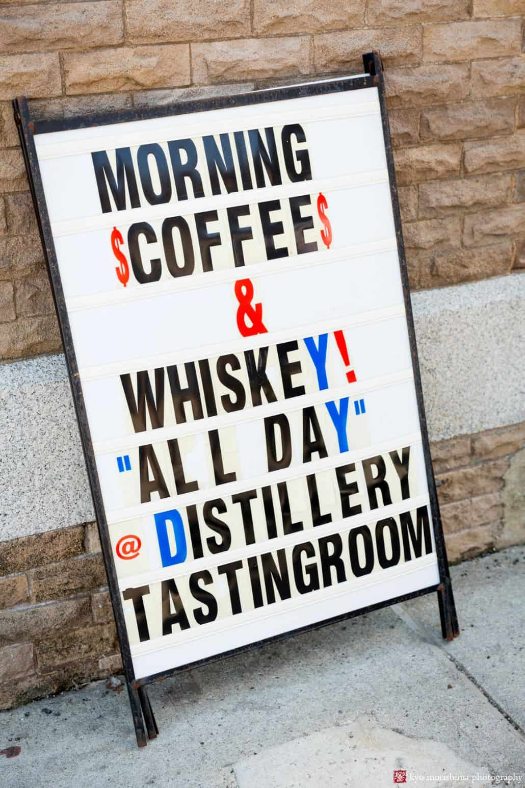 Morning coffee and whiskey signage outside Kings County Distillery at Brooklyn Navy Yard