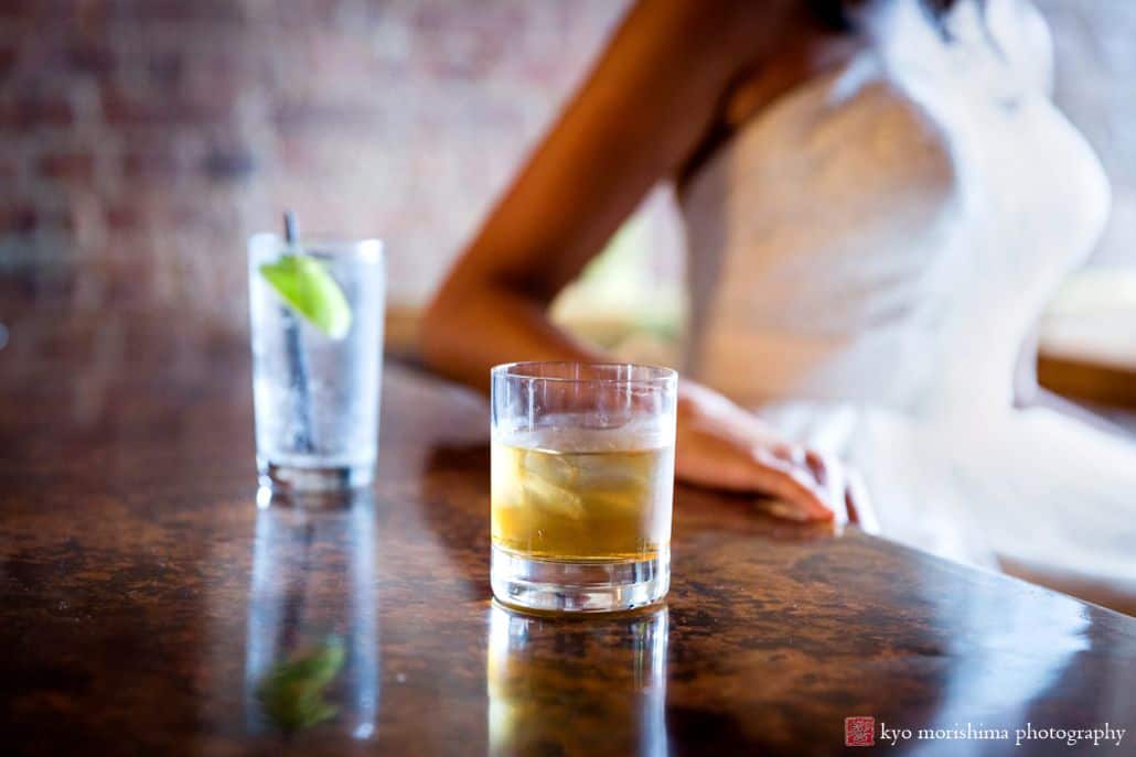 The Crown Inn bar in Crown Heights, brooklyn: two drinks with Bride's torso in the background