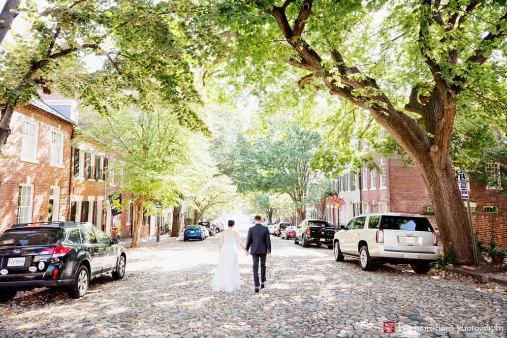 September wedding portrait of bride and groom in Old Town Alexandria shot by photojournalistic wedding photographer Kyo Morishima