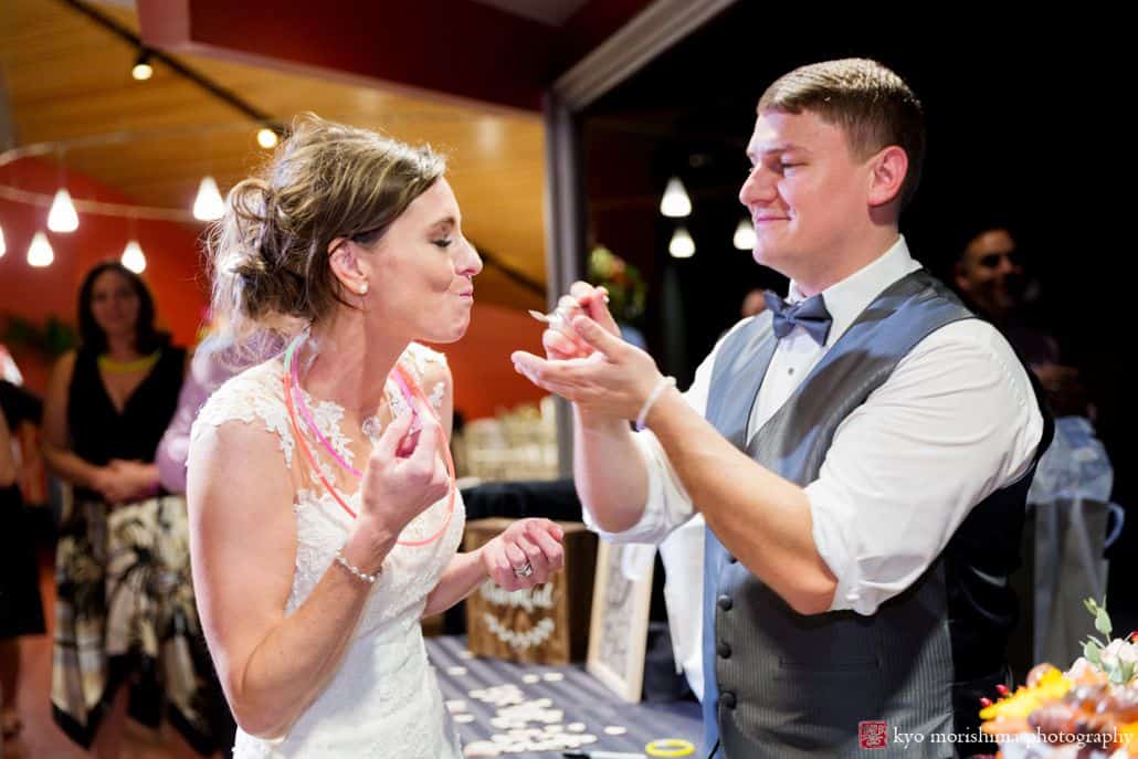 Bride and groom cut the cake during Chauncey Hotel and Laurie House Garden Pavilion wedding in Princeton NJ