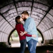 Prospect Park engagement photo: couple kisses in tunnel