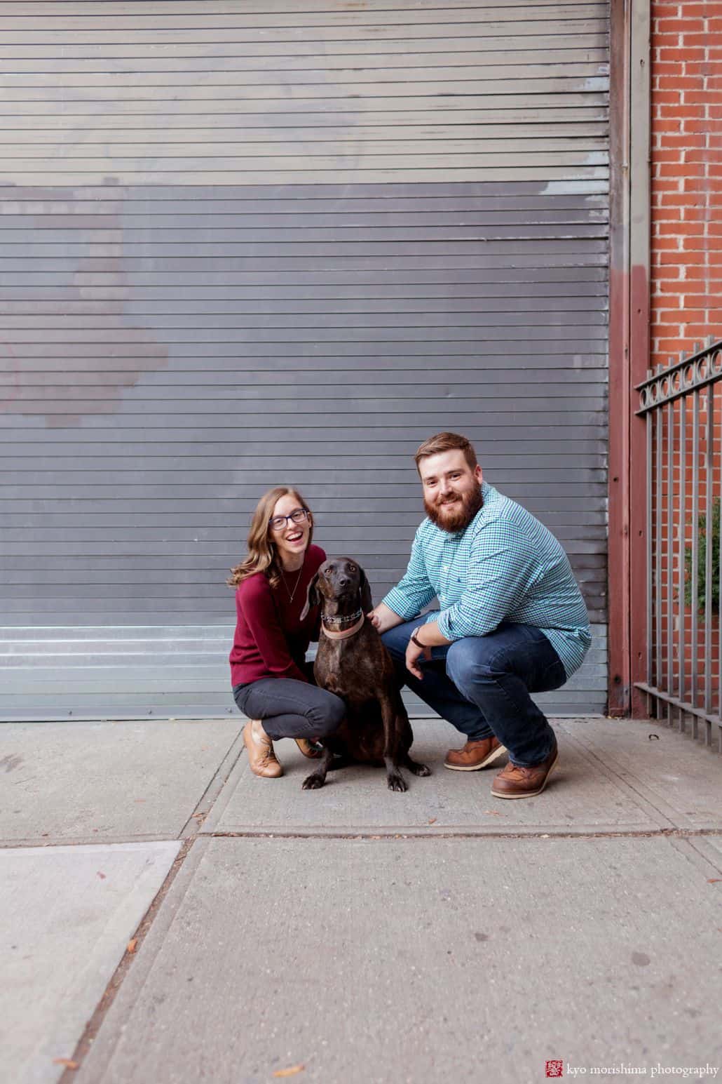 Park Slope engagement picture: couple poses with Weimaraner dog